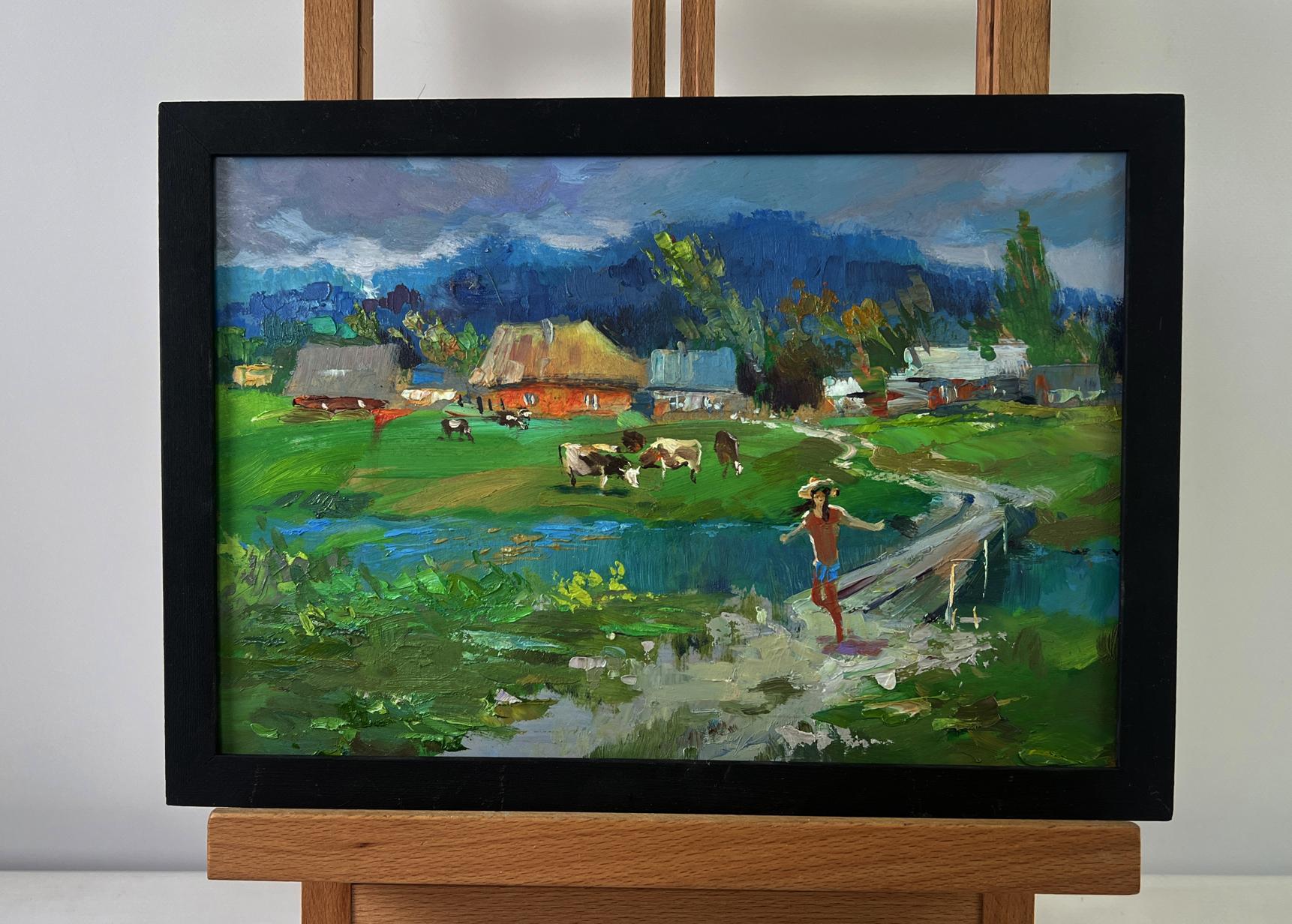Oil painting by Yuriy Suprunchuk: cows grazing by river in rustic village