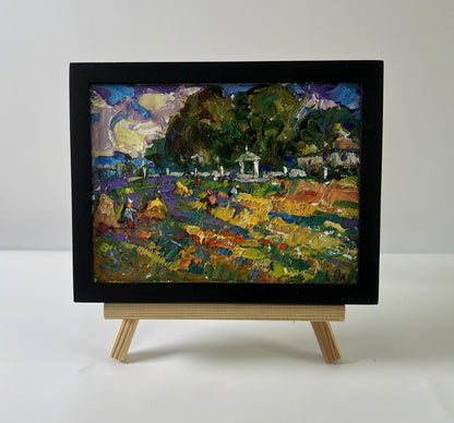 Oil painting Plowing a summer field by Oleksiy Ivanyuk in black frame