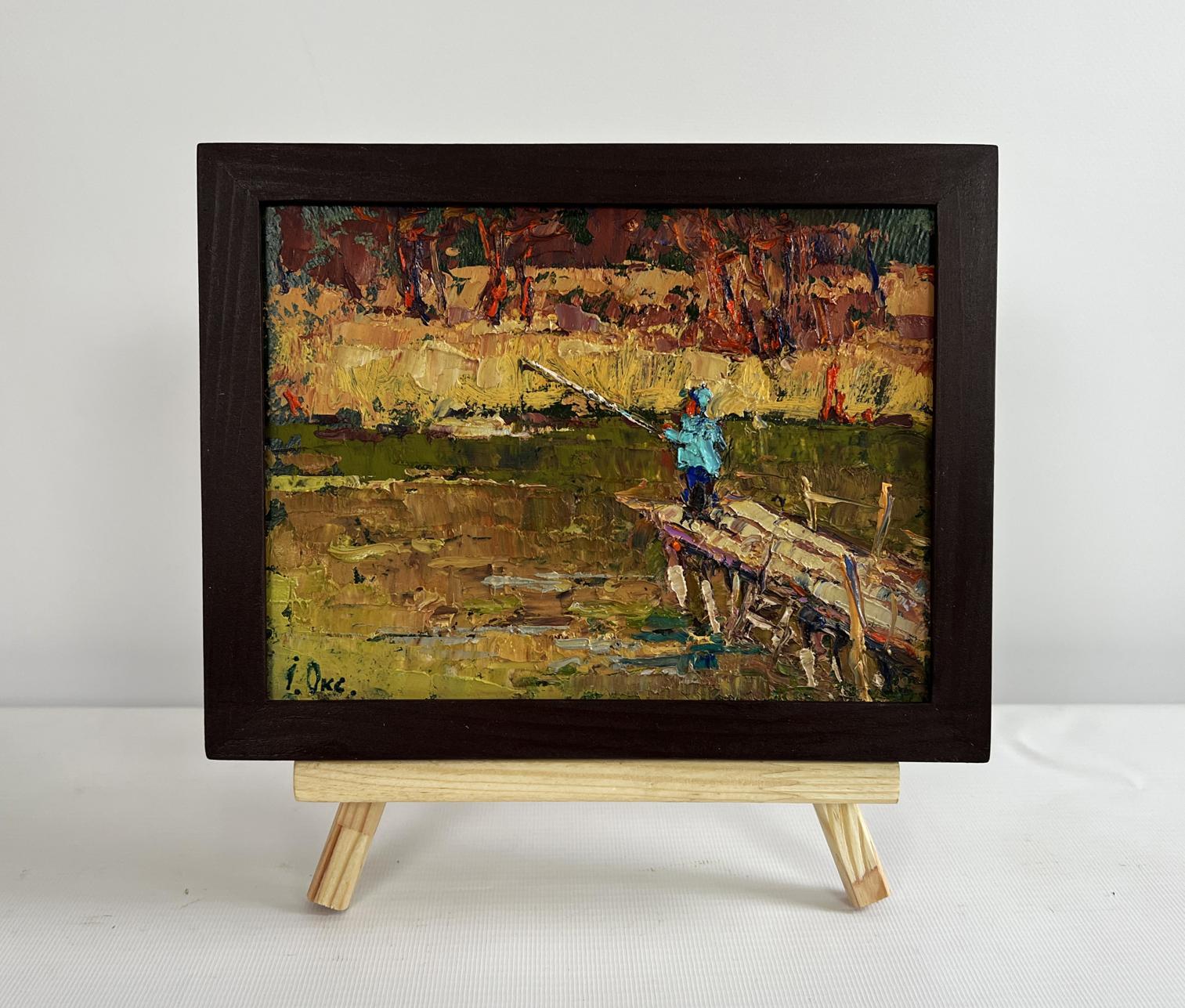 Oil painting The Lonely Fisherman by Oksana Ivanyuk on wooden bridge