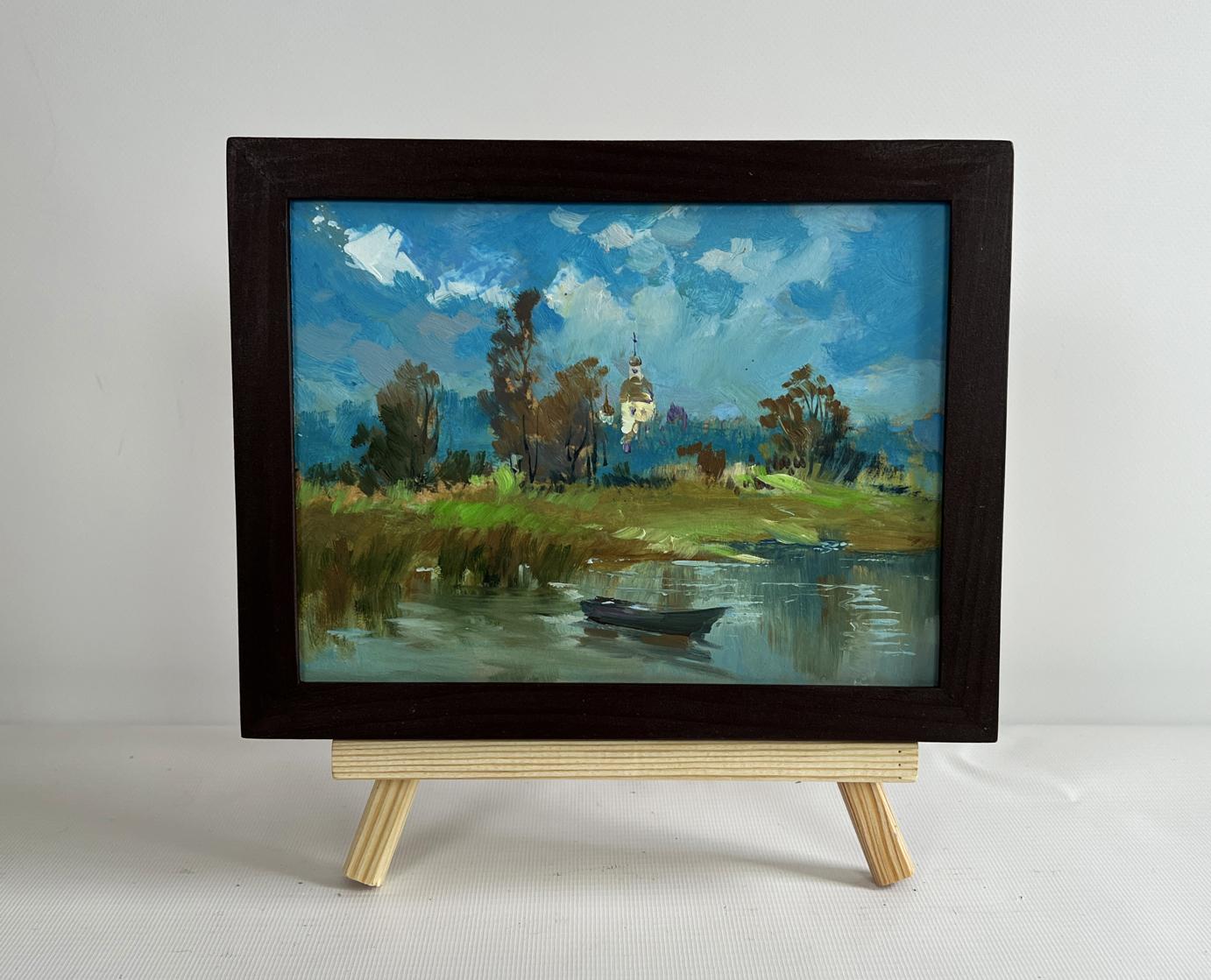 Framed oil painting of lonely boat among reeds by Yuriy Suprunchuk