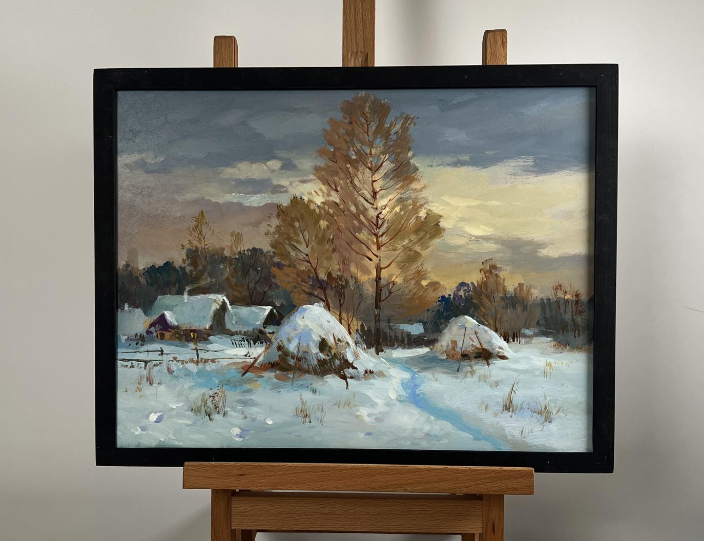 Framed oil painting Snow and sunset lights by Yuriy Suprunchuk with snowy houses