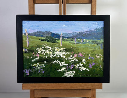 Oil painting Flowering mountain fields by Boris Serdyuk, vibrant green field scene