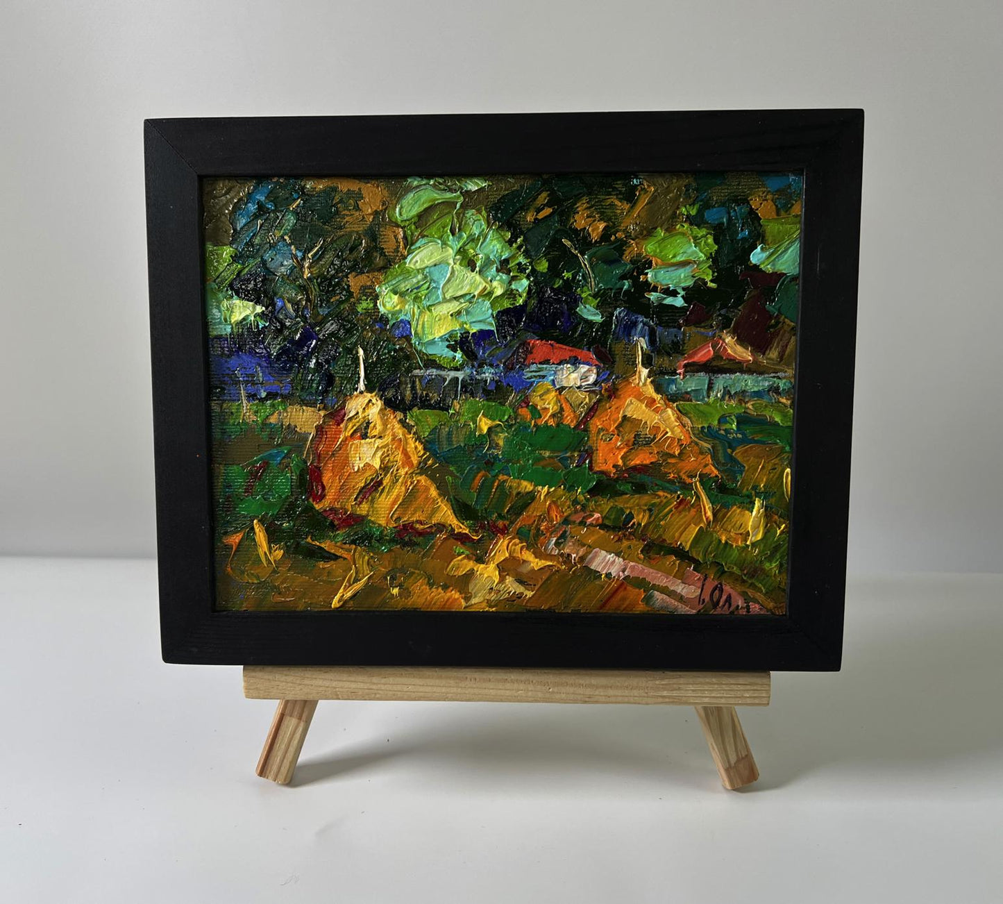 Oil painting Summer evening in the village by Oleksiy Ivanyuk in black frame