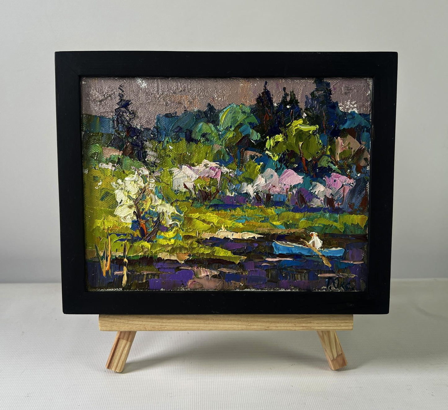 Oil painting Breath of Spring in Green Groves by Oksana Ivanyuk in black frame