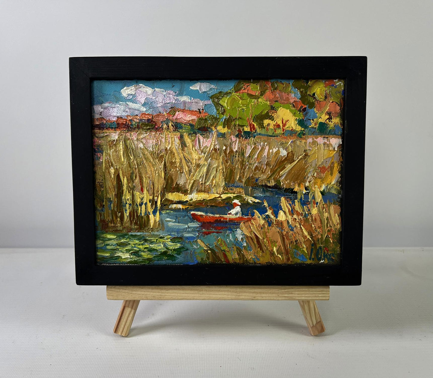 Oil painting Silence of the Water by Oksana Ivanyuk in black frame