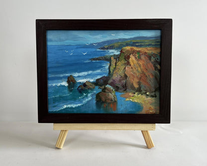 Oil painting Waves crash against the rocks by Yuriy Suprunchuk in frame