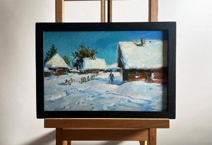 Framed oil painting by Yuriy Suprunchuk of snowy village clearing yard