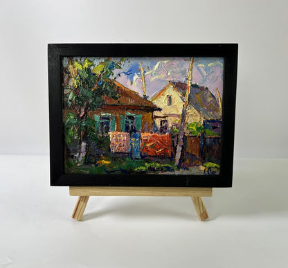 Oil painting Weekend in the village by Oksana Ivanyuk on wooden easel