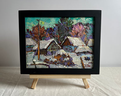 Framed oil painting The Yard is Covered in Snow by Oksana Ivanyuk