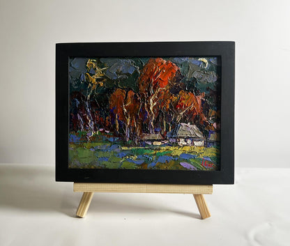 Framed impressionist oil painting by Oksana Ivanyuk: moon over autumn village