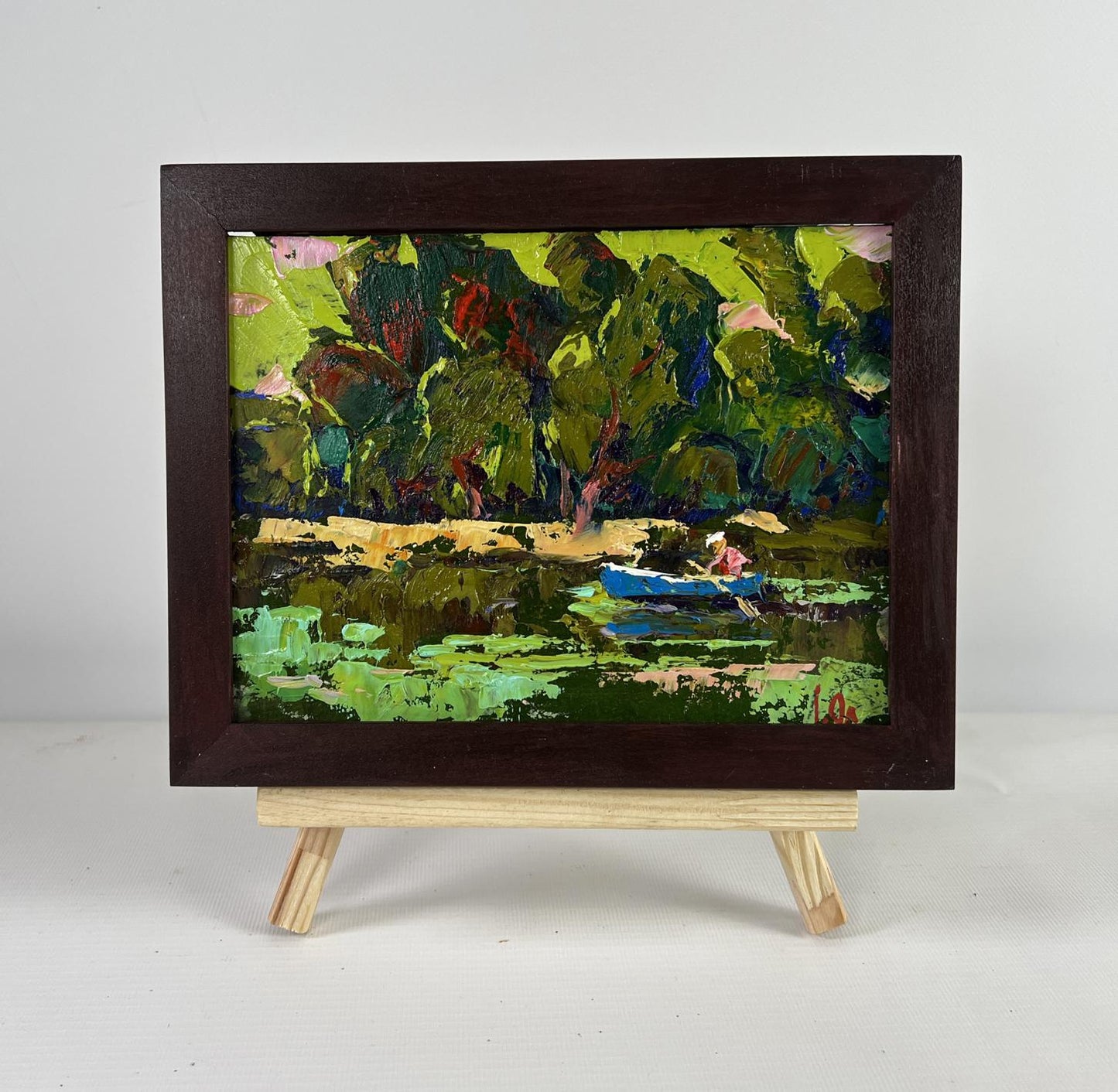 Oil painting Calm on the Water by Oleksiy Ivanyuk, blue boat on lily pond