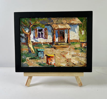 Oil painting Apiary in the Yard by Oksana Ivanyuk on wooden easel