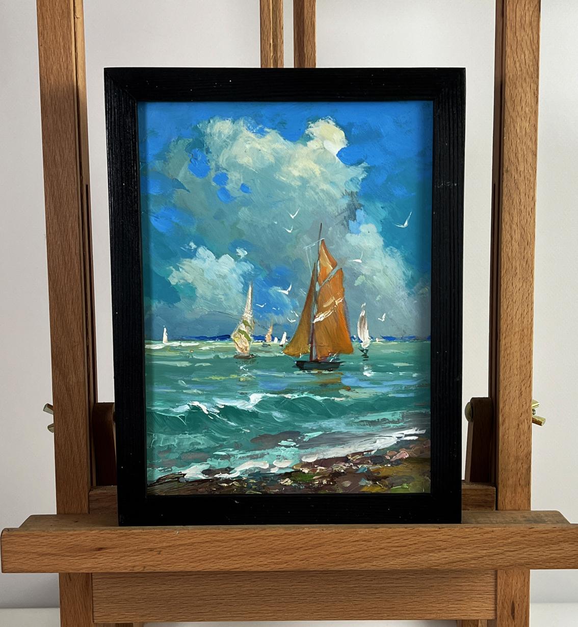 Oil painting of sailboats at sea by Yuriy Suprunchuk in black frame