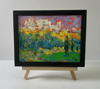 Vibrant Oleksiy Ivanyuk oil painting of city walk with cyclists in black frame