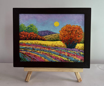 Vibrant oil painting of flower fields by V. Zadorozhnya in black frame