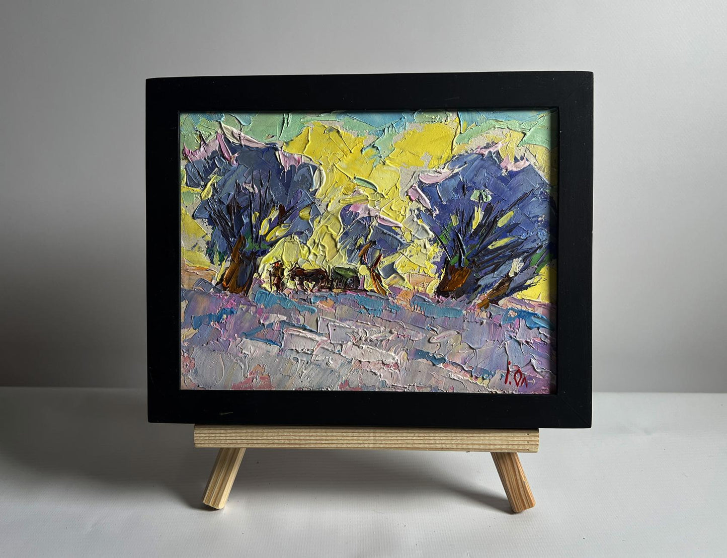 Oil painting Winter morning in the field by Oleksiy Ivanyuk in black frame