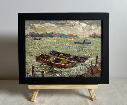 Oil painting Boats near the pier by Oksana Ivanyuk in black frame