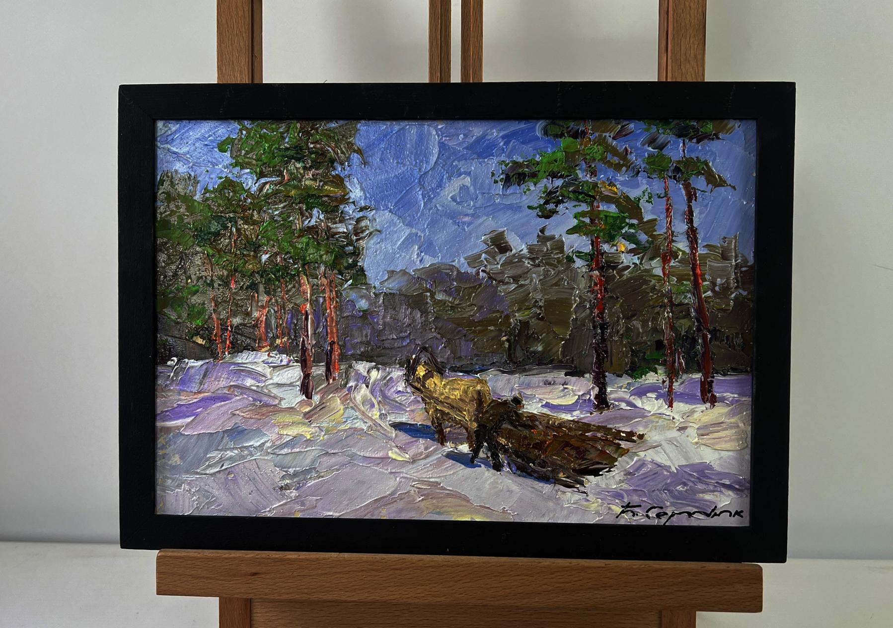 Framed oil painting of snowy forest road with foxes by Boris Serdyuk