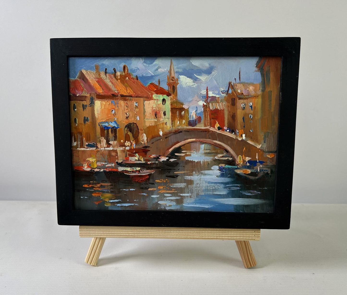Framed oil painting of City Central Bridge by Yuriy Suprunchuk