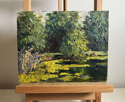 Oil painting In the forest pond by Boris Serdyuk, lush green foliage and water