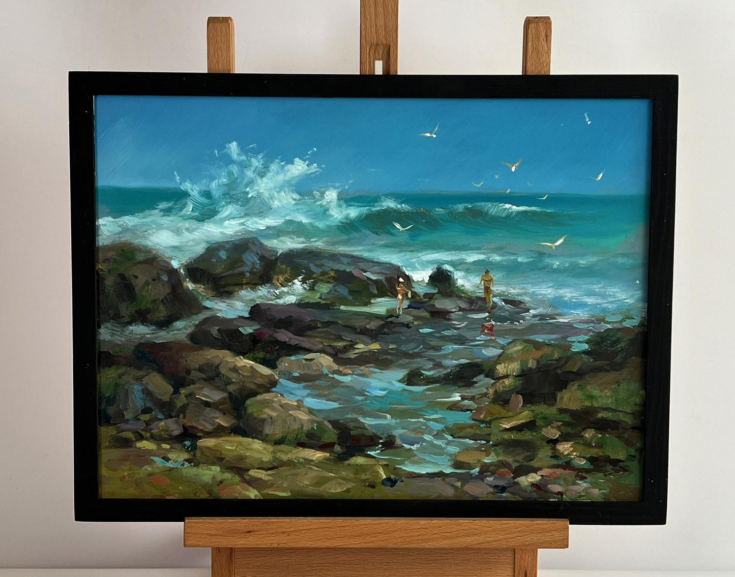 Oil painting Seashore with people by Yuriy Suprunchuk, coastal waves and figures