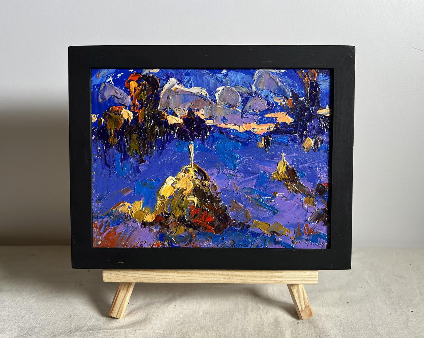 Oil painting The last rays of the sun by Oleksiy Ivanyuk in black frame