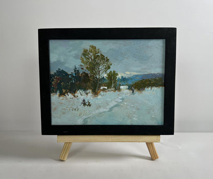 Oil painting Winter twilight by Yuriy Suprunchuk snowy landscape on easel
