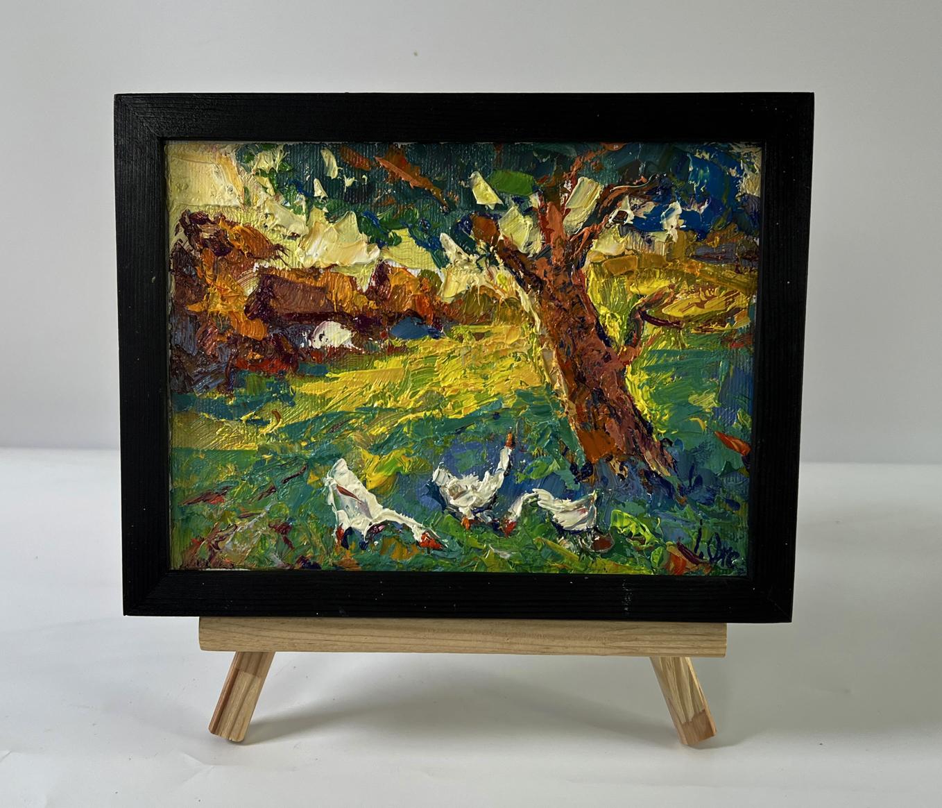 Vibrant oil painting In the Shade of the Trees by Oksana Ivanyuk, geese in field on easel