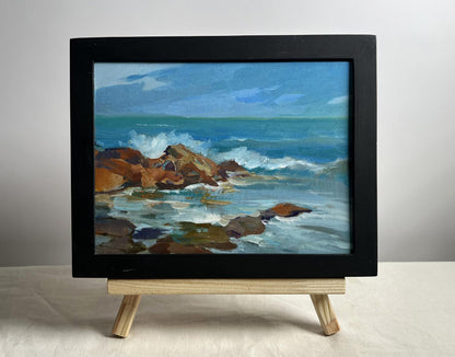 Framed oil painting by Yuriy Suprunchuk of waves crashing on rocks
