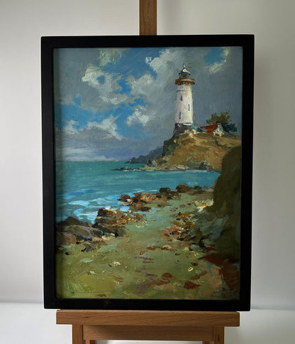 Oil painting Coast with a lighthouse by Yuriy Suprunchuk in black frame