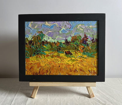 Oil painting Field and Forests by Oleksiy Ivanyuk in black frame