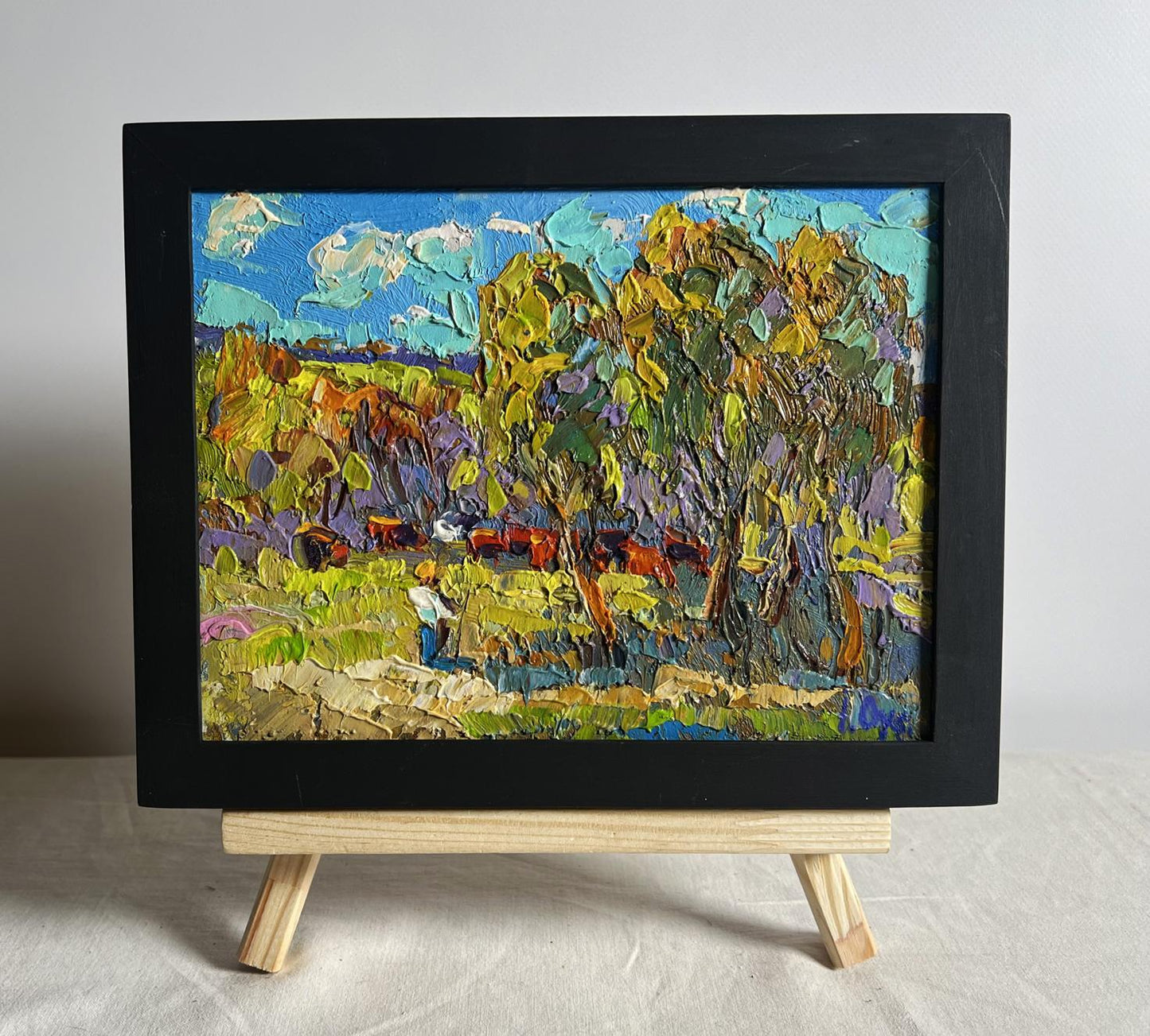 Oil painting Hot day in the field by Oksana Ivanyuk in black frame