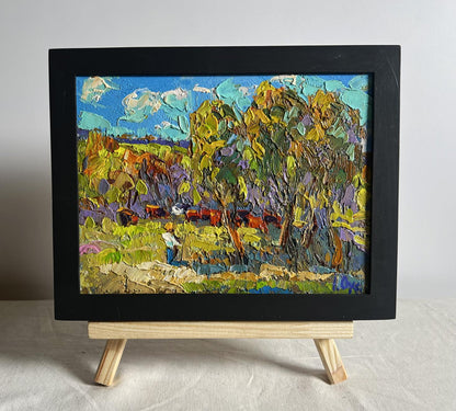 Oil painting Hot day in the field by Oksana Ivanyuk in black frame