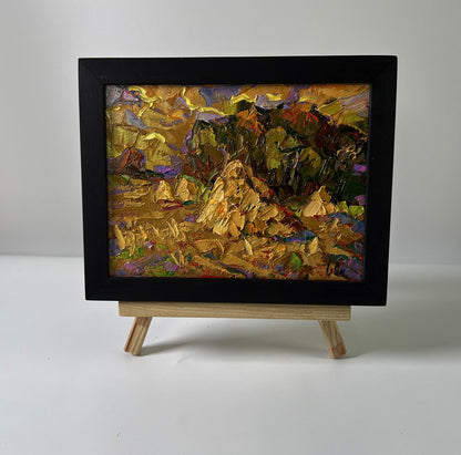 Oil painting Warm evening in the field by Oksana Ivanyuk in black frame
