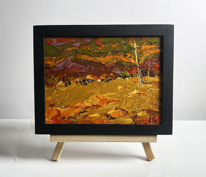 Oil painting of orange sunset over mountains by Oleksiy Ivanyuk