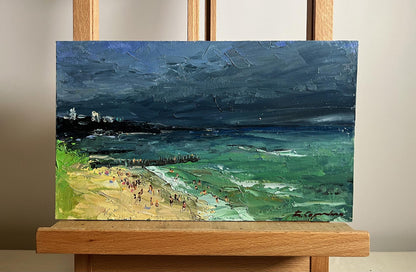 Oil painting of stormy beach with people by Boris Serdyuk