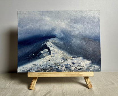 Oil painting Snow storm in the mountains by Tatyana Derdey, snowy peak under stormy skies
