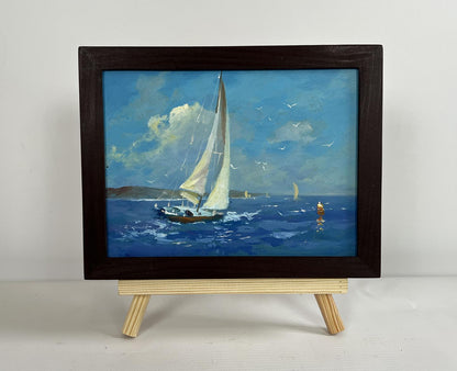 Framed miniature oil painting of sailboat voyage by Yuriy Suprunchuk