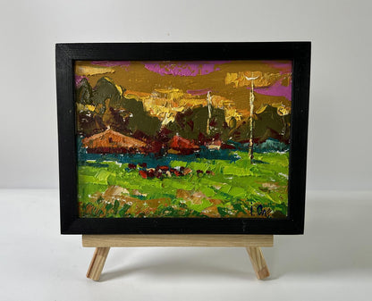 Oil painting Evening village by Oleksiy Ivanyuk in black frame