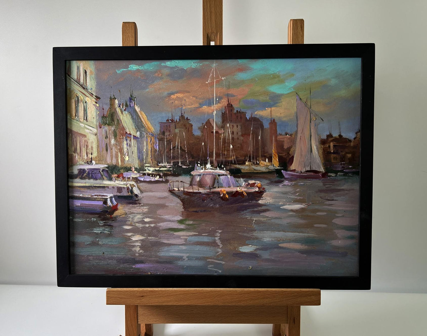 Framed oil painting of city sailboats by Yuriy Suprunchuk