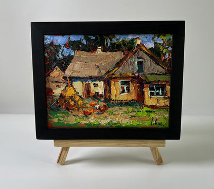 Oil painting Silence in a village house by Oksana Ivanyuk in black frame