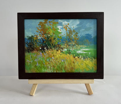 Oil painting Walking among flower fields by Yuriy Suprunchuk on wooden easel