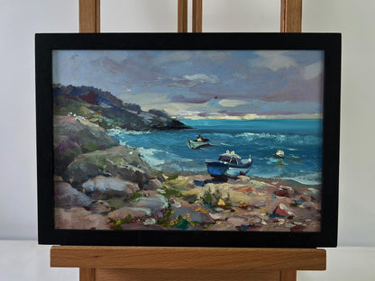 Oil painting by Yuriy Suprunchuk: sea waves crashing on rocky shores in black frame