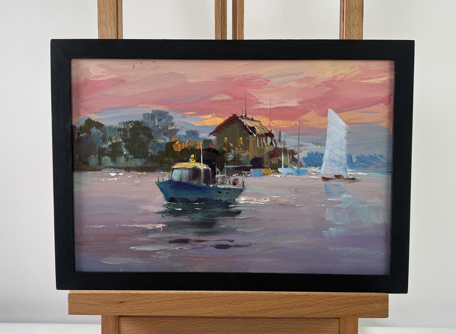 Framed oil painting of harbor boats at sunset by Yuriy Suprunchuk
