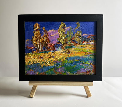 Oil painting Blue sky over the fields by Oksana Ivanyuk in black frame