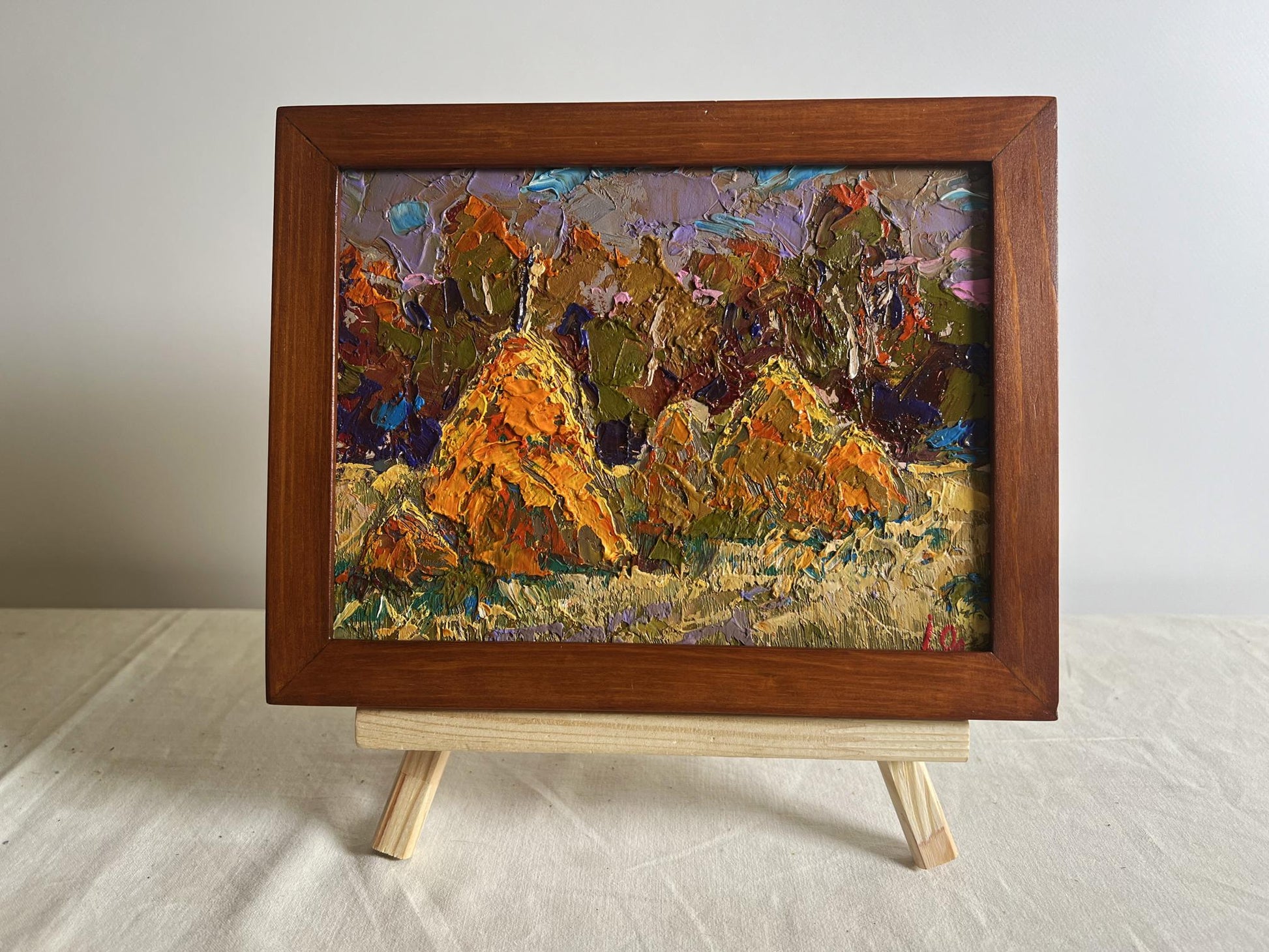Oil painting Haystacks in the field by Oleksiy Ivanyuk impasto landscape