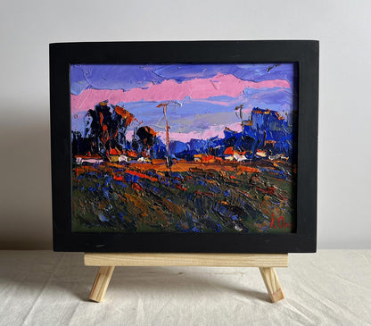 Vibrant impressionist oil painting of pink sunset by Oksana Ivanyuk in black frame