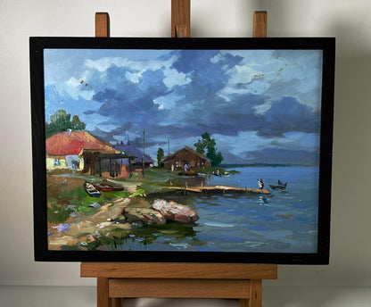 Oil painting by Yuriy Suprunchuk: houses near river bank lakeside village