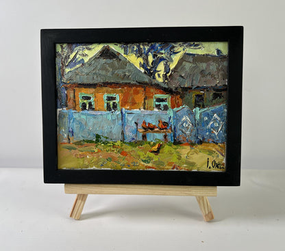 Oil painting Quiet Village Days by Oksana Ivanyuk in black frame
