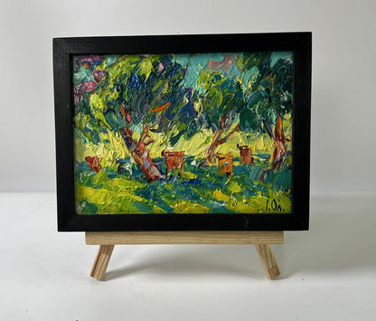 Oil painting In the shade of the trees by Oleksiy Ivanyuk, pastoral scene in black frame